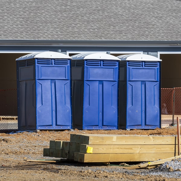 how often are the portable restrooms cleaned and serviced during a rental period in Otis